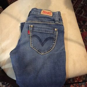 A pair of Levi Jeans; Style 524 Too Superlow